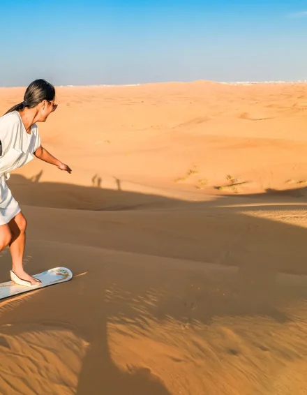 Dubai disert safari surfing women
